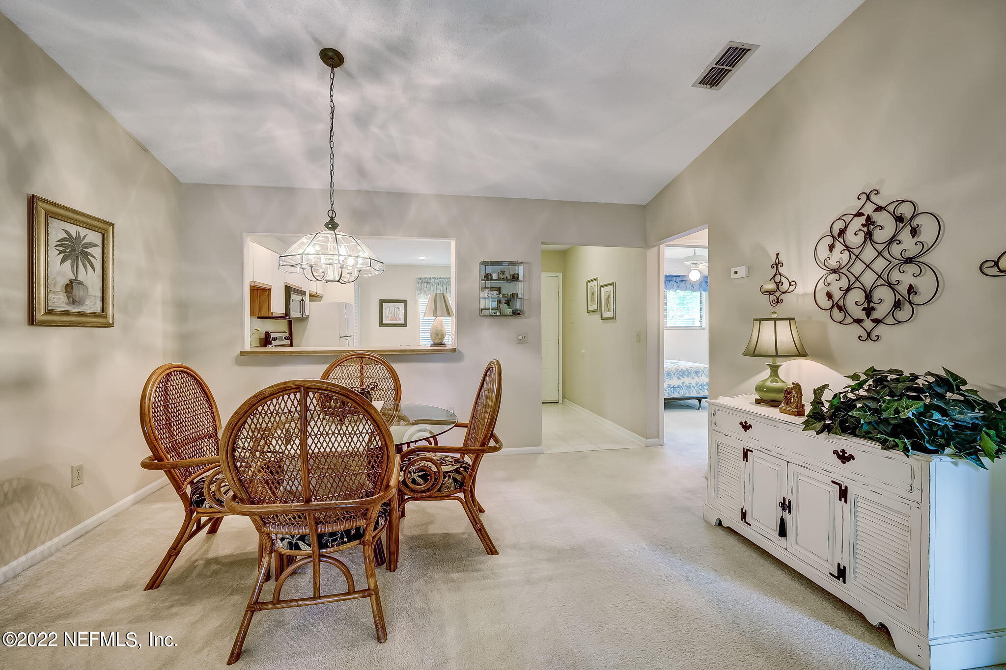 3801 Crown Point Road, Unit 1265 Jacksonville, FL 32257 - Photo 4 of 8 a view of a dining room with furniture
