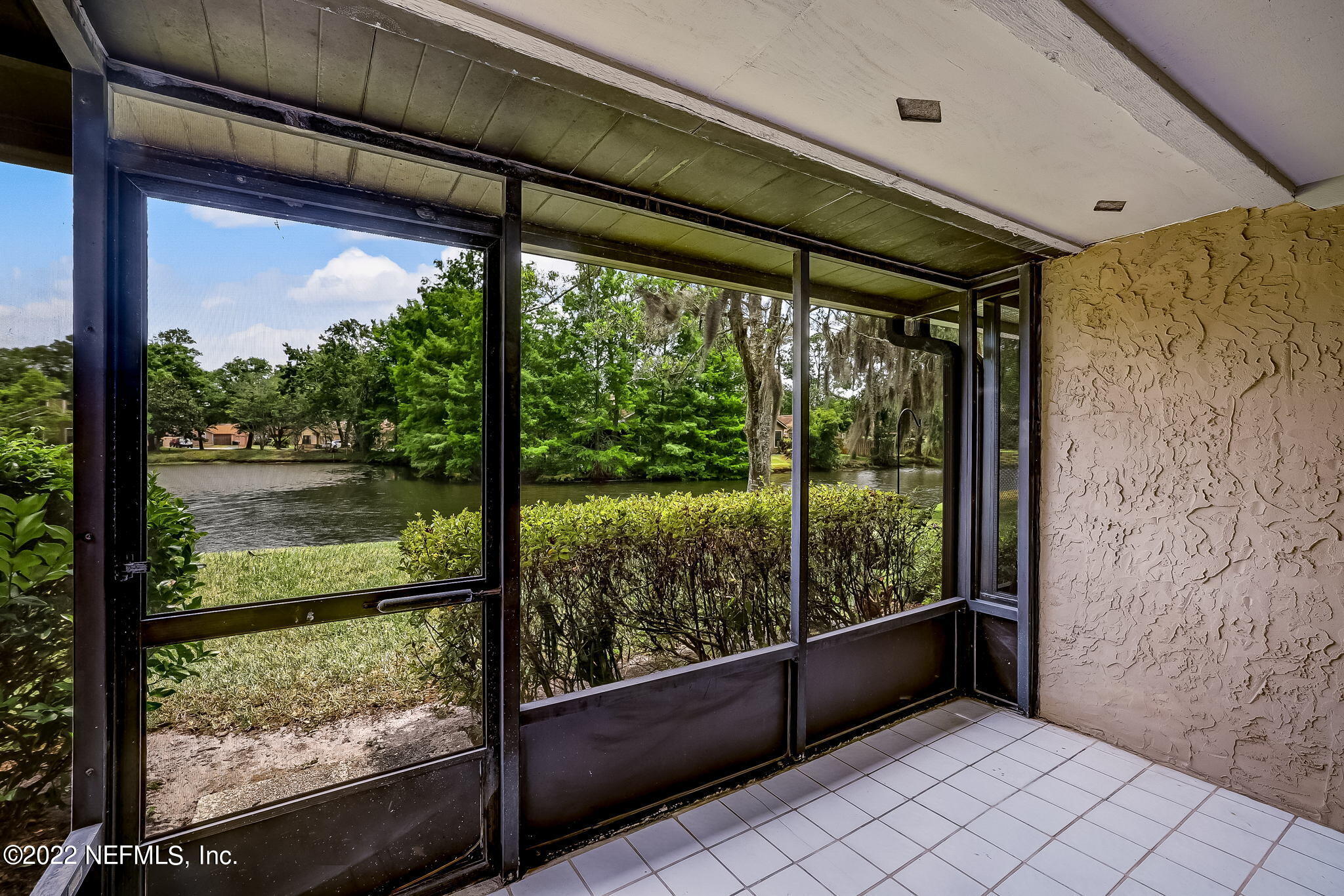 3801 Crown Point Road, Unit 1265 Jacksonville, FL 32257 - Photo 8 of 8 a view of a large window with an outdoor space
