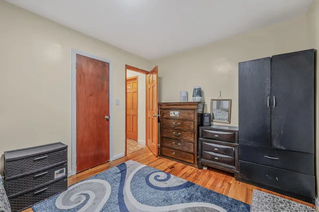 a room with furniture and a wooden floor