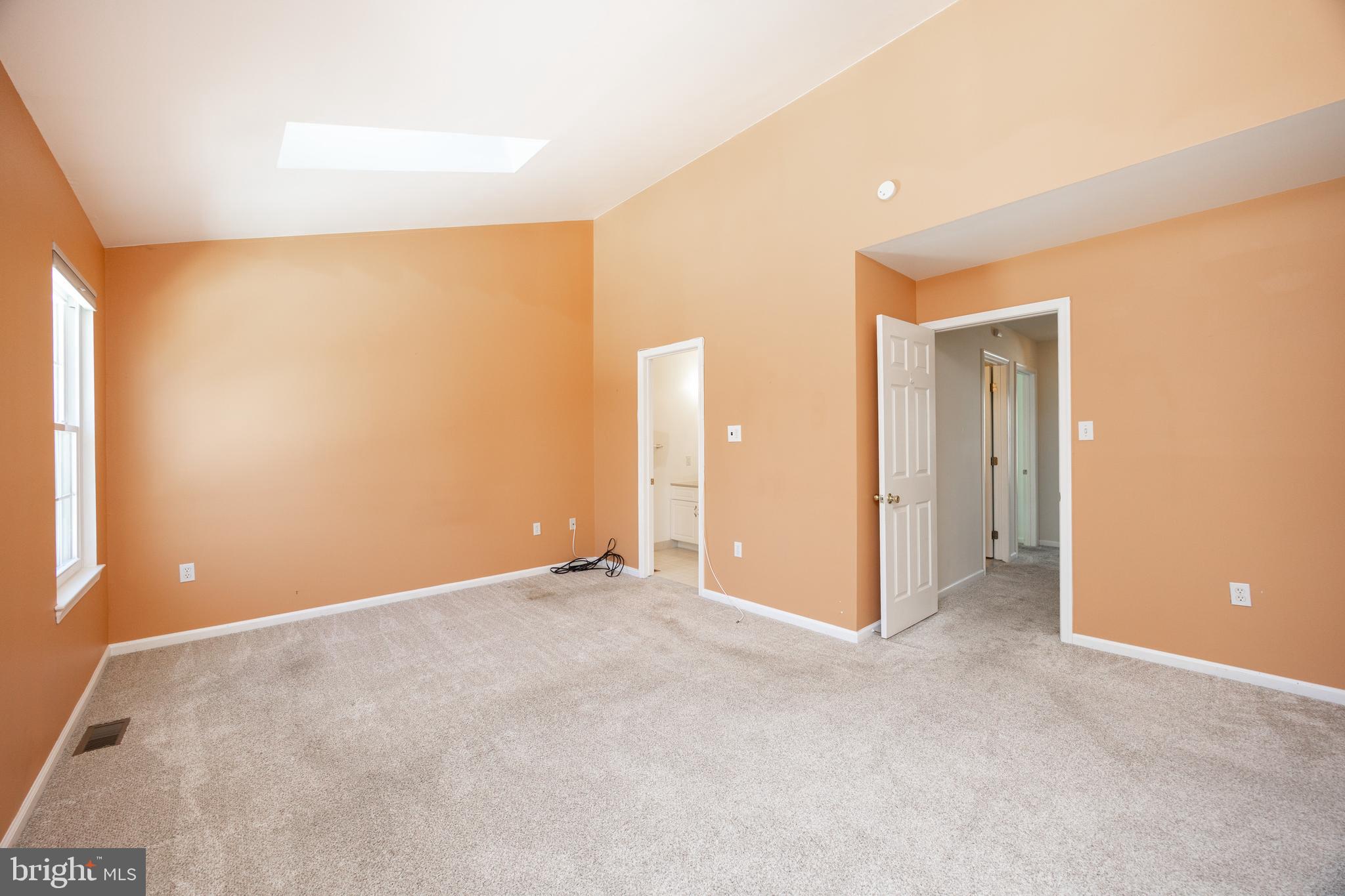 222 Springvalley Way Aston, PA 19014 - Photo 17 of 45 a view of an empty room with a window