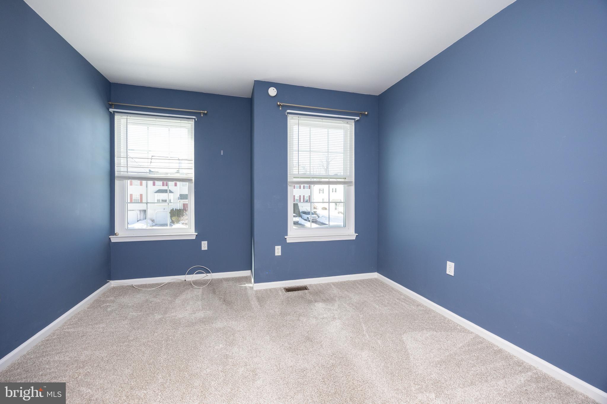 222 Springvalley Way Aston, PA 19014 - Photo 24 of 45 a view of a big room with windows