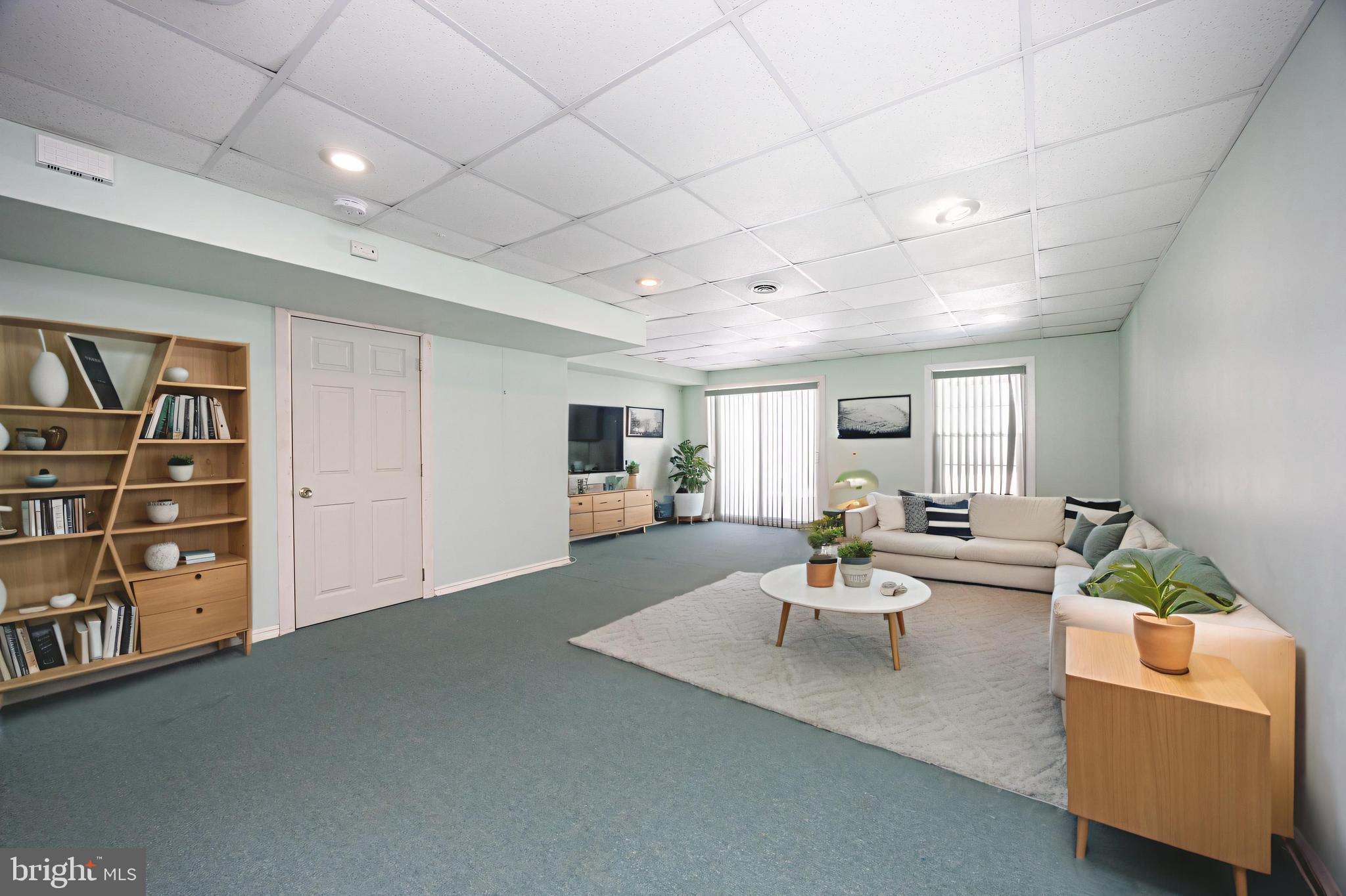 222 Springvalley Way Aston, PA 19014 - Photo 28 of 45 a living room with furniture and a wooden floor