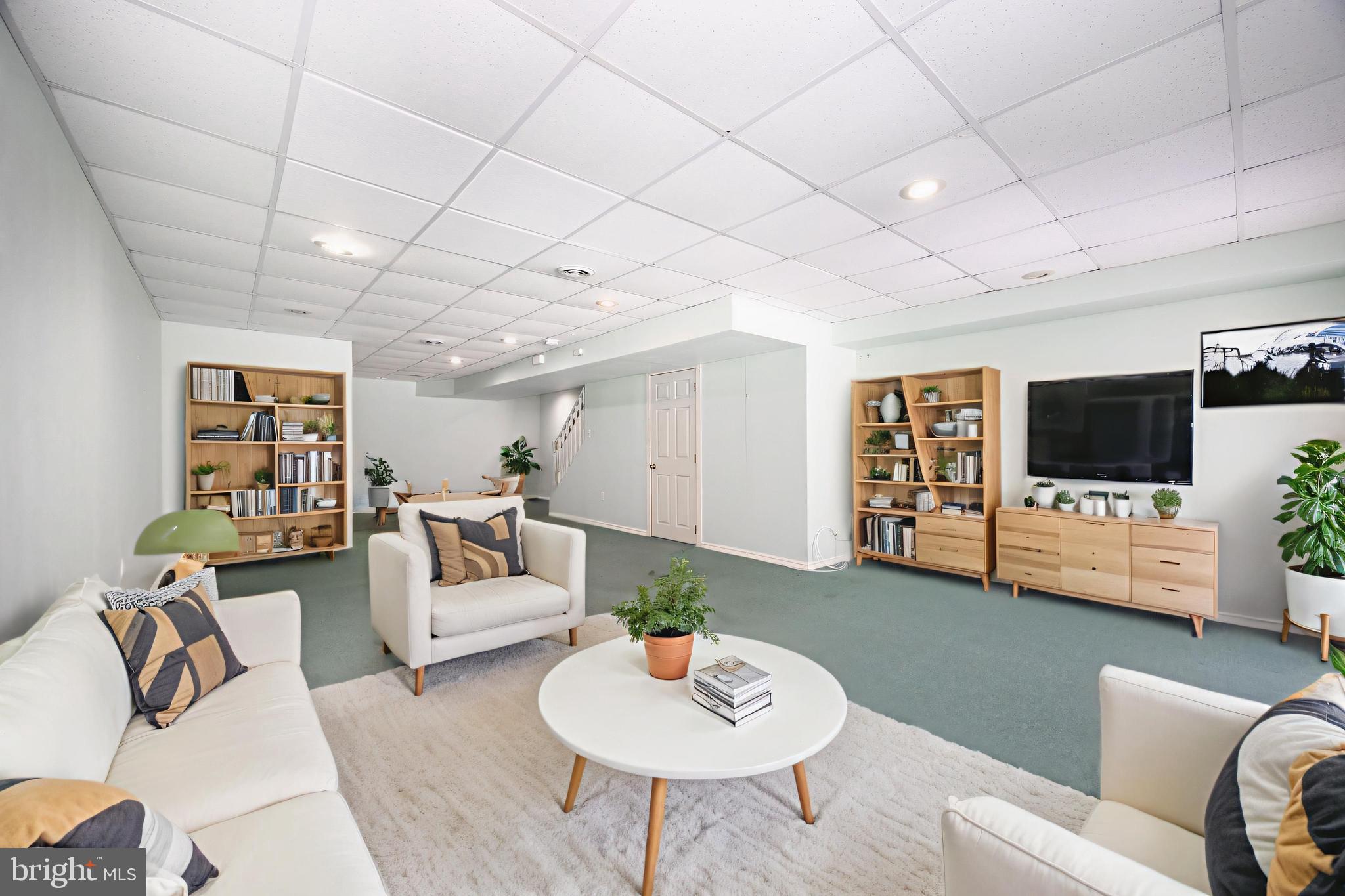 222 Springvalley Way Aston, PA 19014 - Photo 30 of 45 a living room with furniture and a flat screen tv