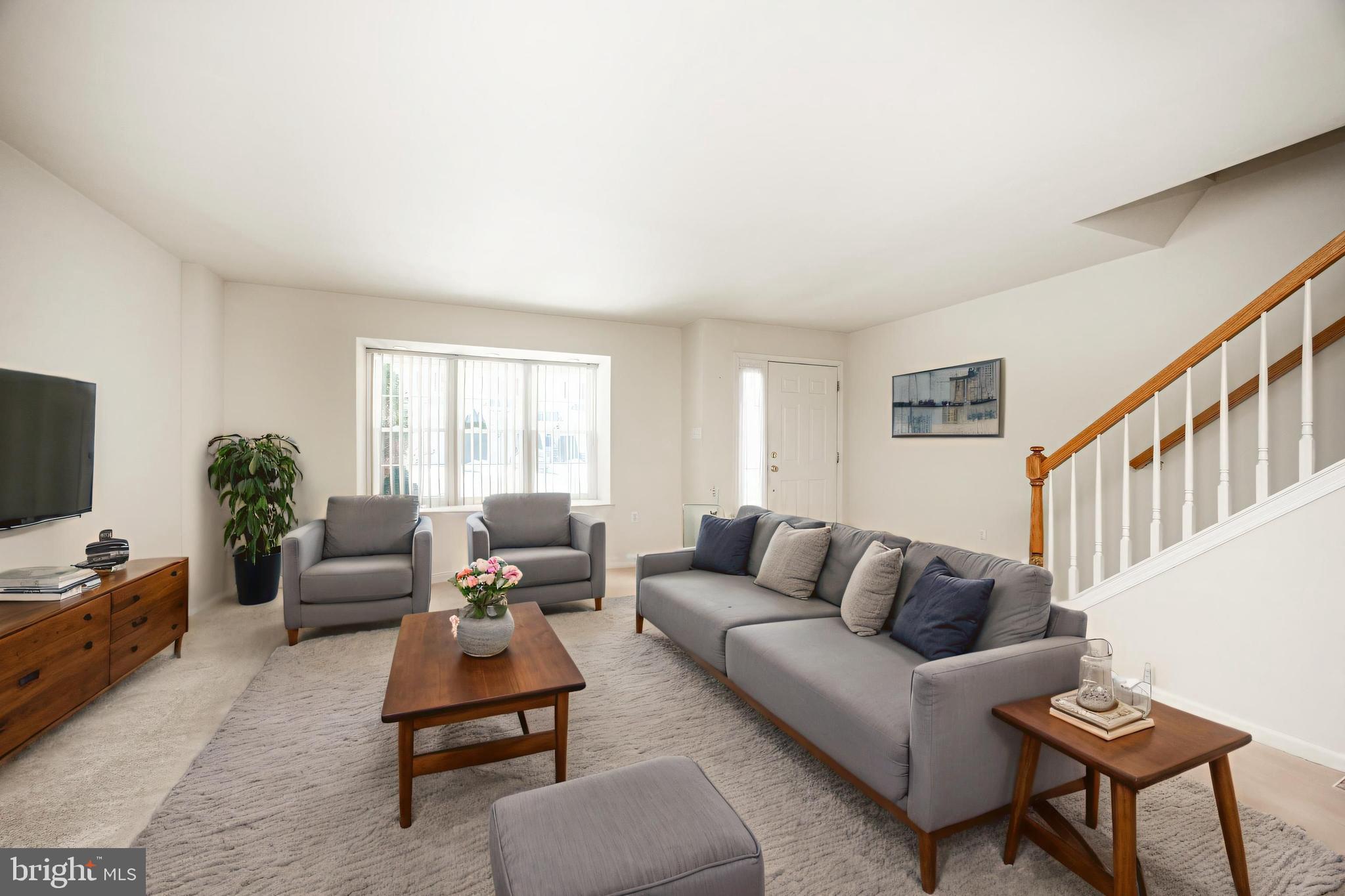 222 Springvalley Way Aston, PA 19014 - Photo 4 of 45 a living room with furniture wooden floor and a window