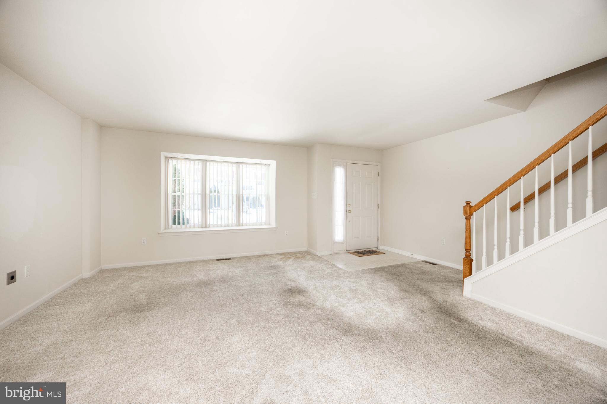 222 Springvalley Way Aston, PA 19014 - Photo 5 of 45 a view of an empty room with a window
