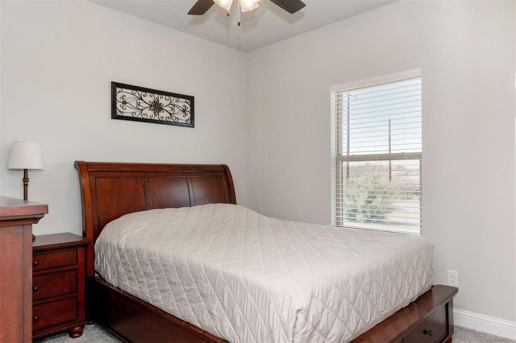 849 County Road 4764 Boyd, TX 76023 - Photo 21 of 40 a bedroom with a bed and a window