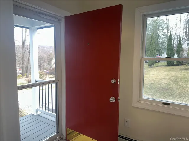 a view of an empty room and window
