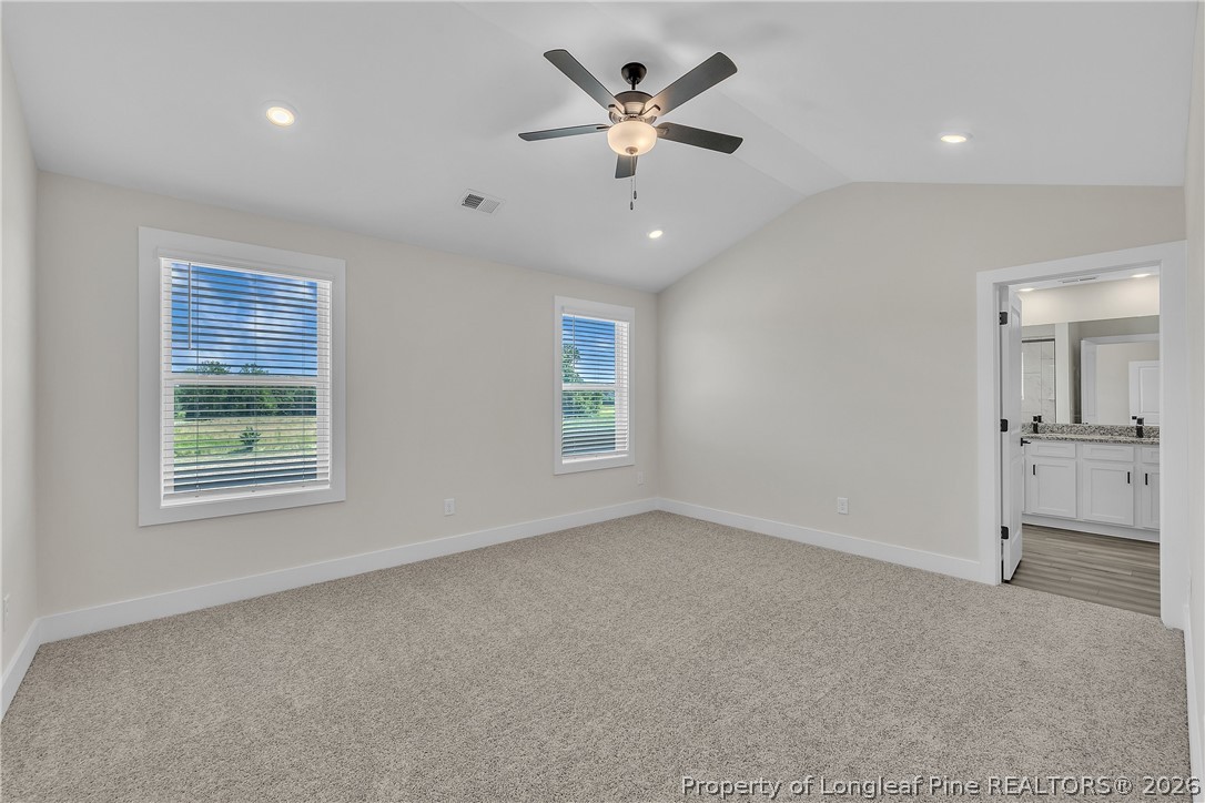 85 Camp Rock Road Lillington, NC 27546 - Photo 13 of 20 a view of an empty room with a window