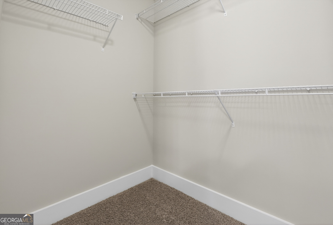 97 Wards Creek Road, Unit 1 Toccoa, GA 30577 - Photo 31 of 55 a view of a room with racks on the wall