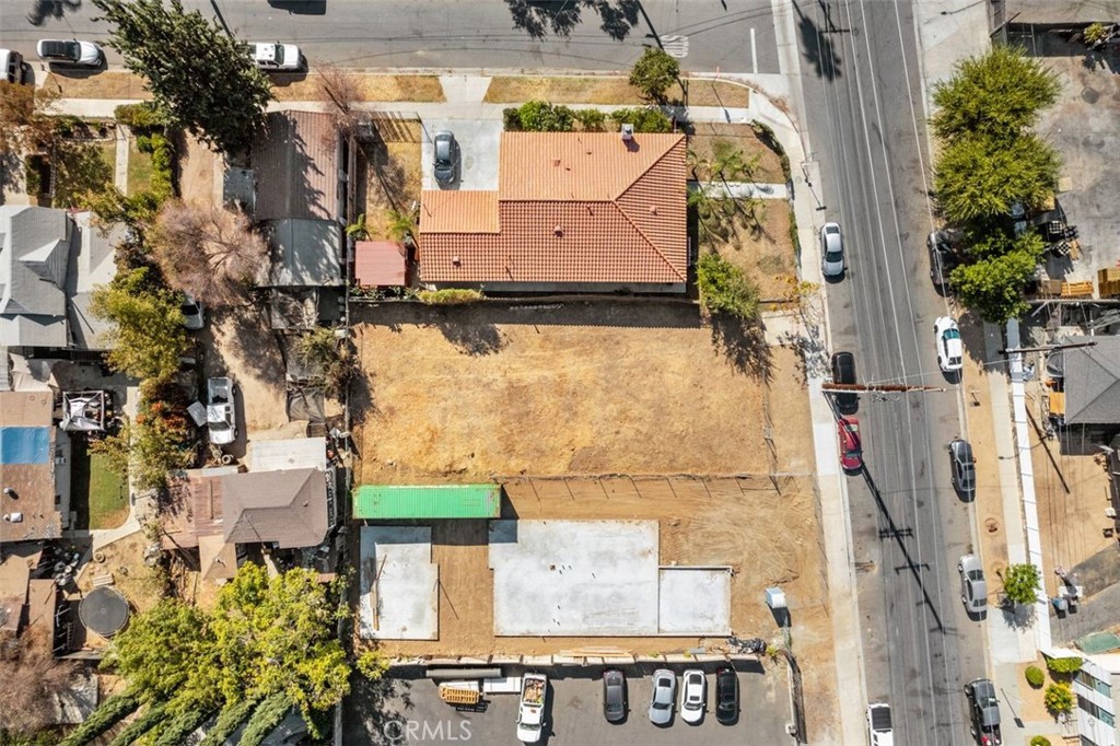 7538 Evans Street Riverside, CA 92504 - Photo 11 of 12 an aerial view of residential houses with outdoor space