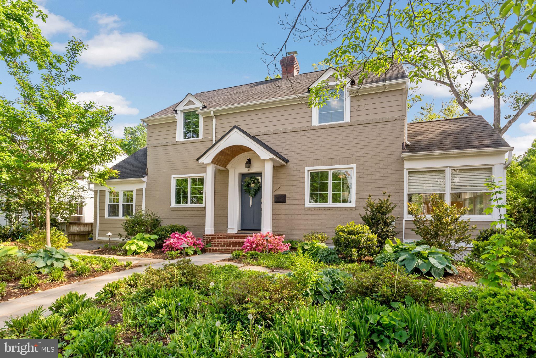 810 Grand View Drive Alexandria, VA 22305 - Photo 38 of 55 a front view of a house with yard