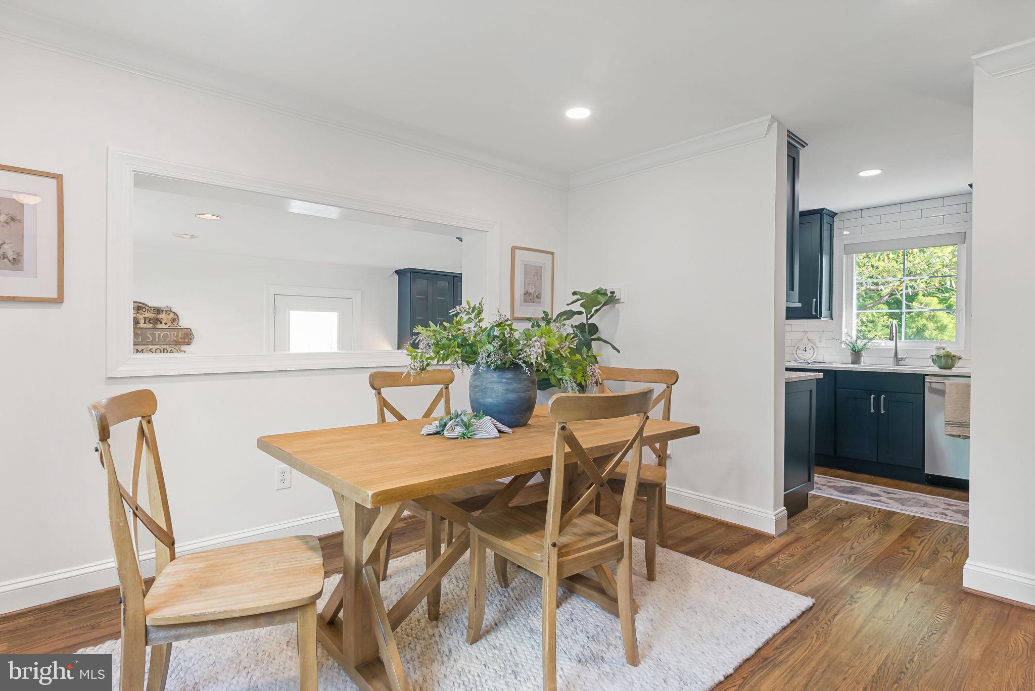 810 Grand View Drive Alexandria, VA 22305 - Photo 42 of 55 a dining room with furniture and window
