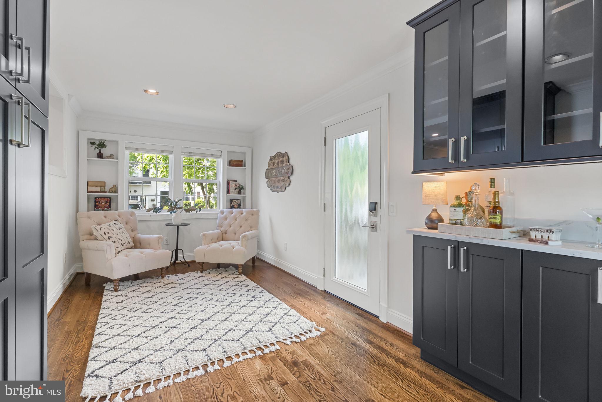 810 Grand View Drive Alexandria, VA 22305 - Photo 43 of 55 a bathroom with a granite countertop sink and mirror