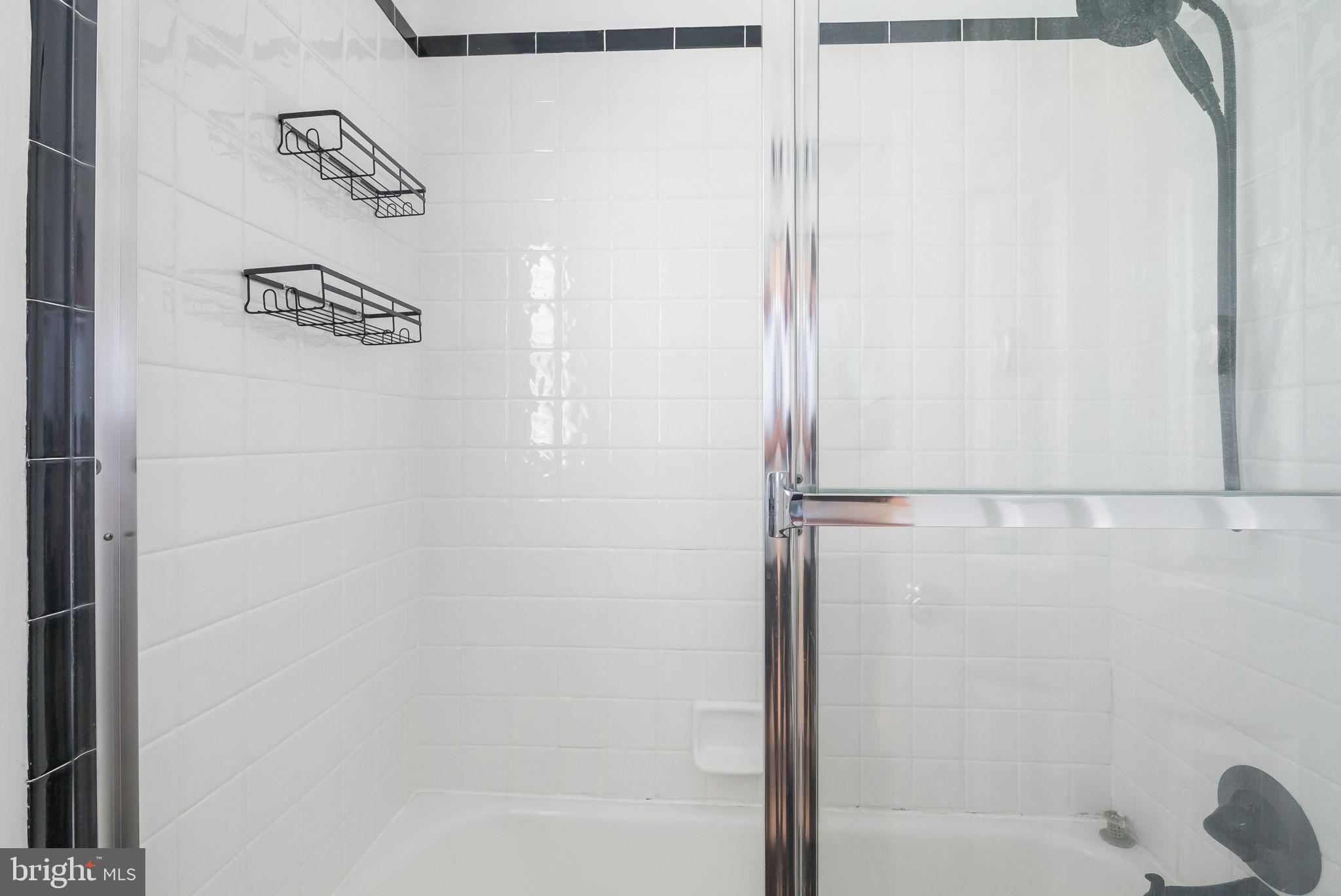 810 Grand View Drive Alexandria, VA 22305 - Photo 48 of 55 a bathroom with a shower