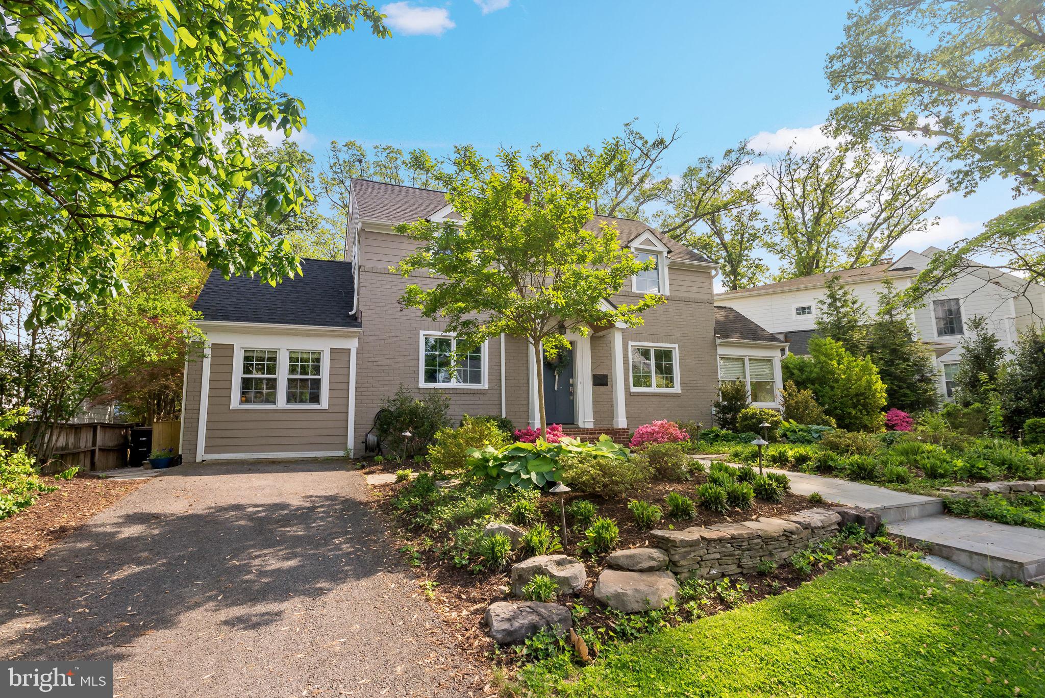810 Grand View Drive Alexandria, VA 22305 - Photo 52 of 55 a front view of a house with a yard