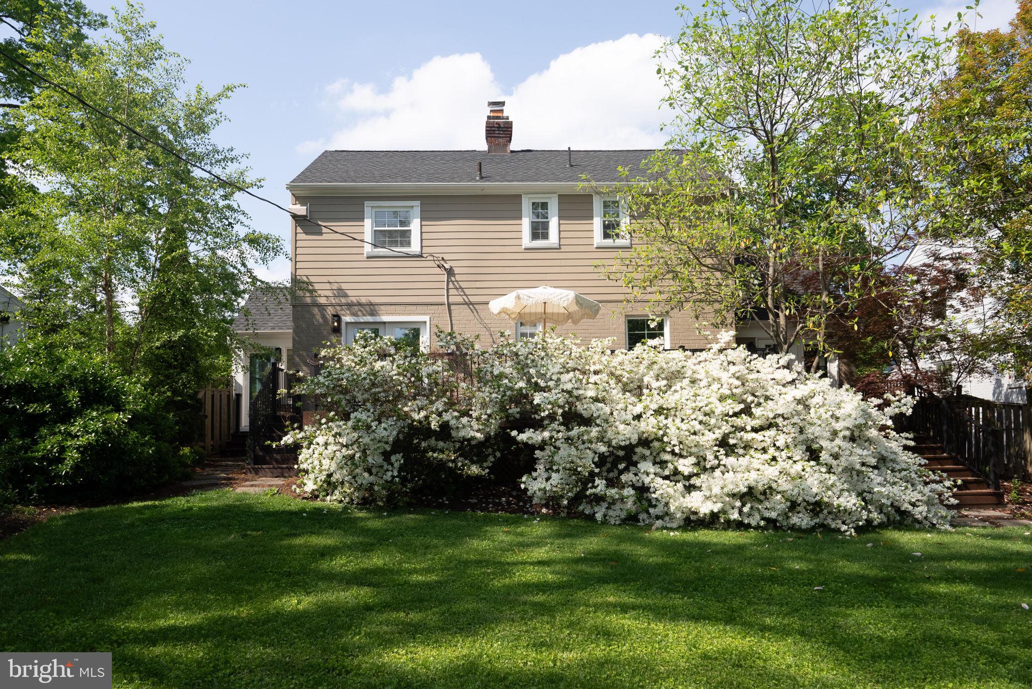 810 Grand View Drive Alexandria, VA 22305 - Photo 55 of 55 a front view of house with garden