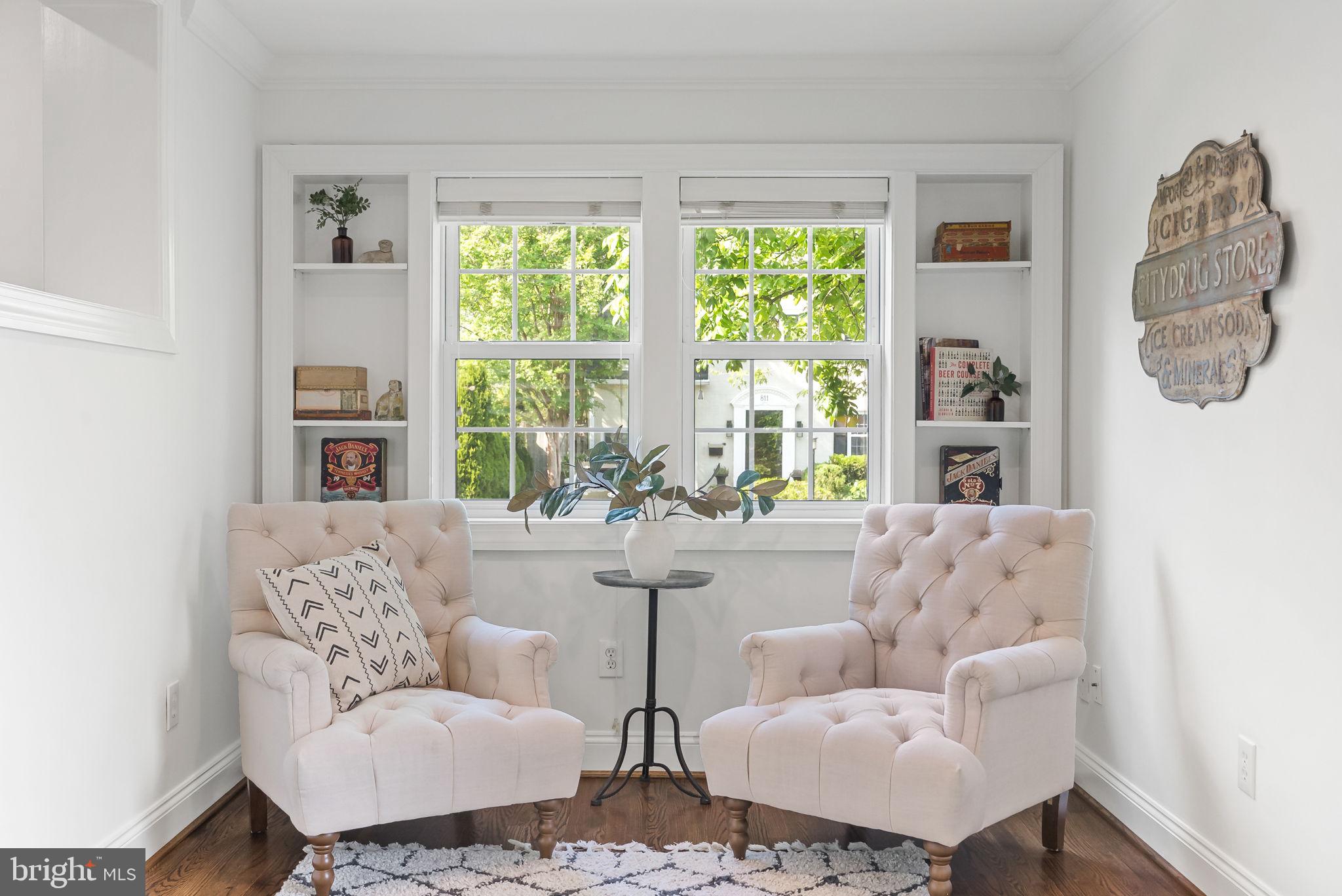 810 Grand View Drive Alexandria, VA 22305 - Photo 9 of 55 a living room with furniture and a large window