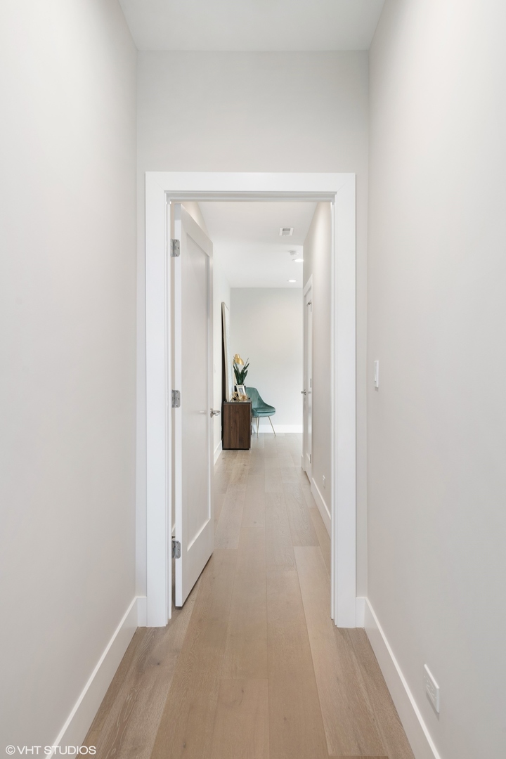 2342 West Adams Street, Unit 505 Chicago, IL 60612 - Photo 11 of 20 a view of a hallway with closet