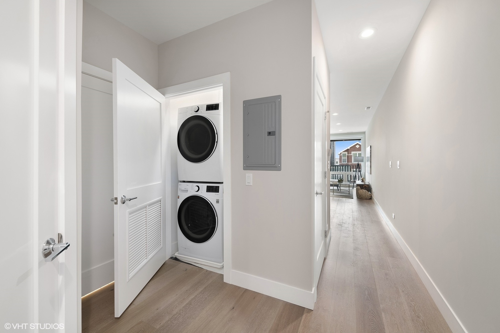 2342 West Adams Street, Unit 505 Chicago, IL 60612 - Photo 18 of 20 a view of a hallway with washer and dryer