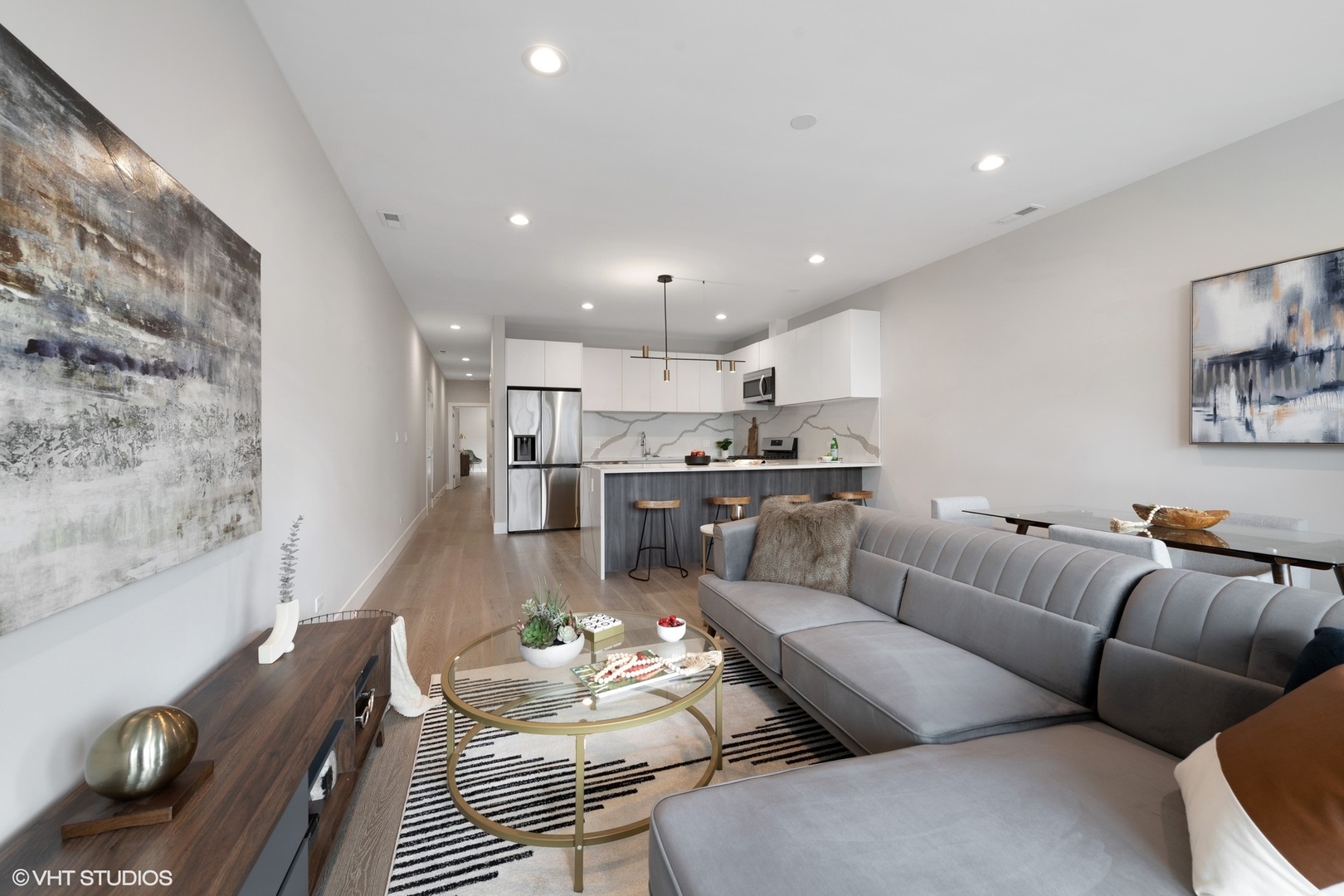 2342 West Adams Street, Unit 505 Chicago, IL 60612 - Photo 8 of 20 a living room with furniture kitchen and a table