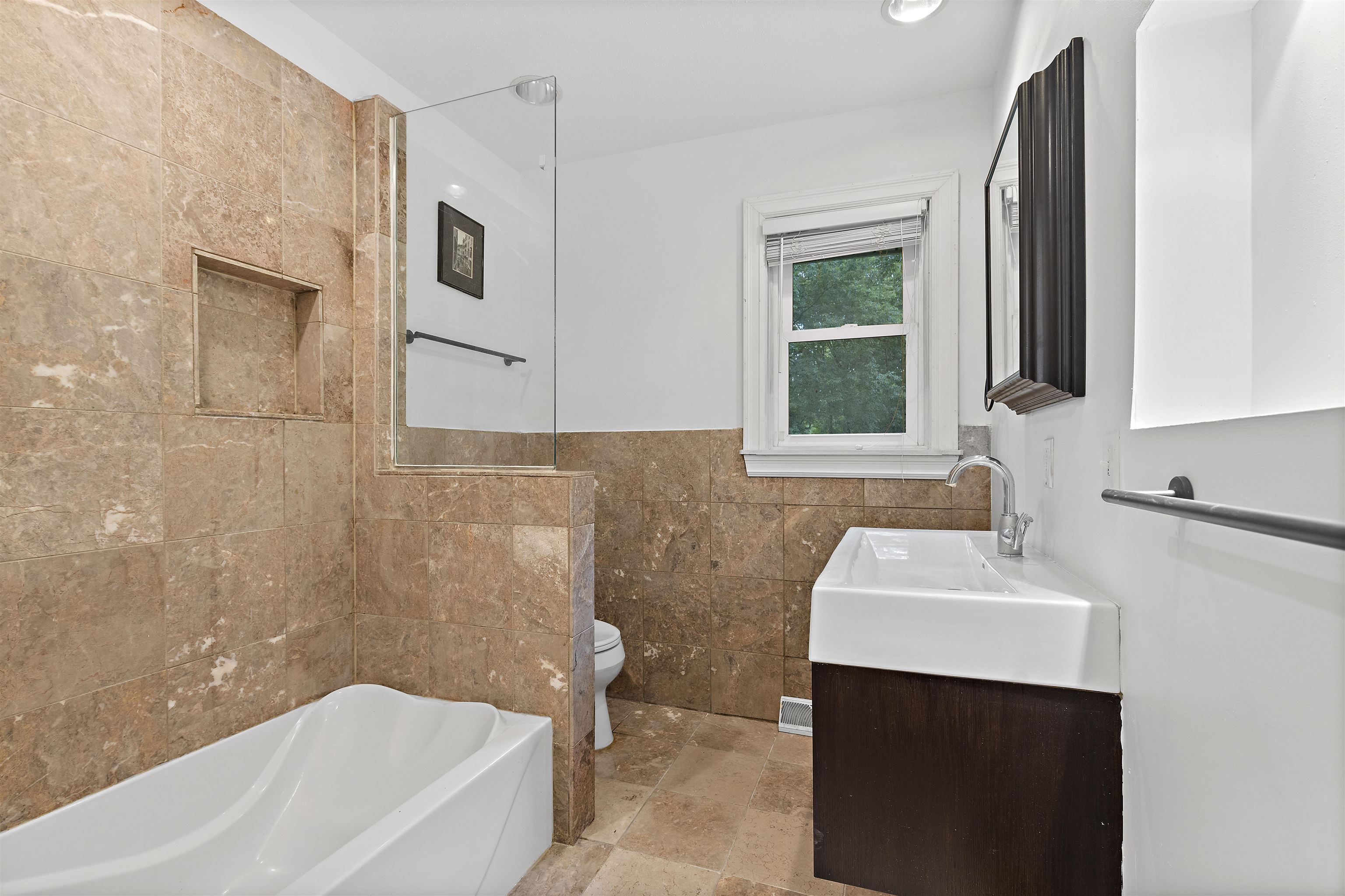 2906 Reid Farm Road Rockford, IL 61114 - Photo 12 of 18 a bathroom with a sink and a bathtub