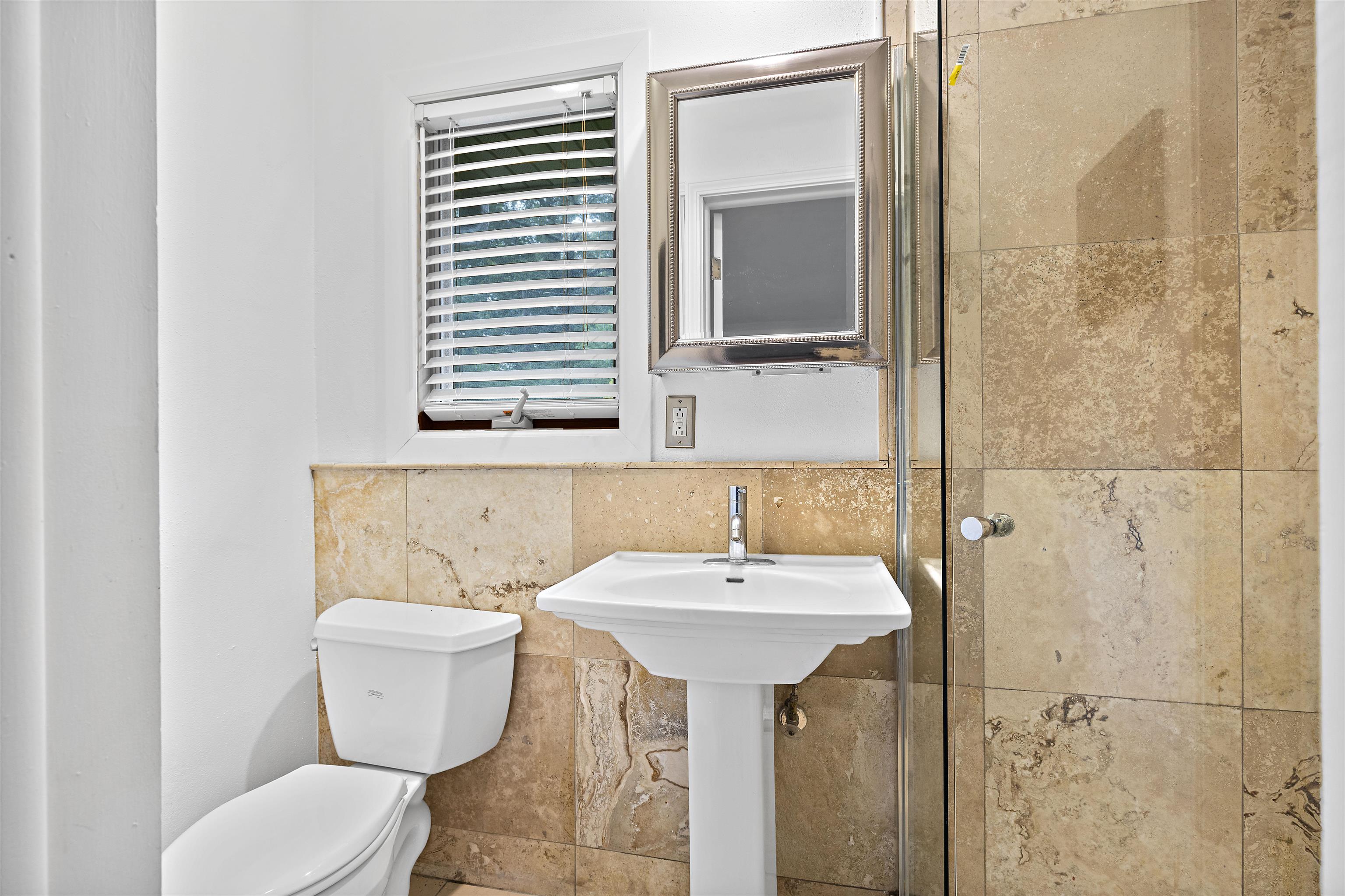 2906 Reid Farm Road Rockford, IL 61114 - Photo 13 of 18 a bathroom with a sink toilet and mirror