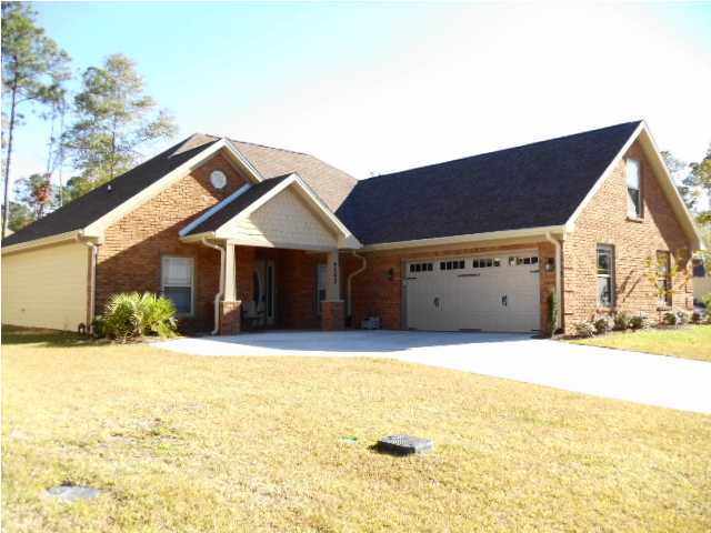 4543 Hermosa Road Crestview, FL 32539 - Photo 1 of 1 a front view of house with yard