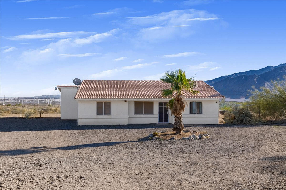 15310 Desert View Road Whitewater, CA 92282 - Photo 2 of 4 a front view of a house with a yard