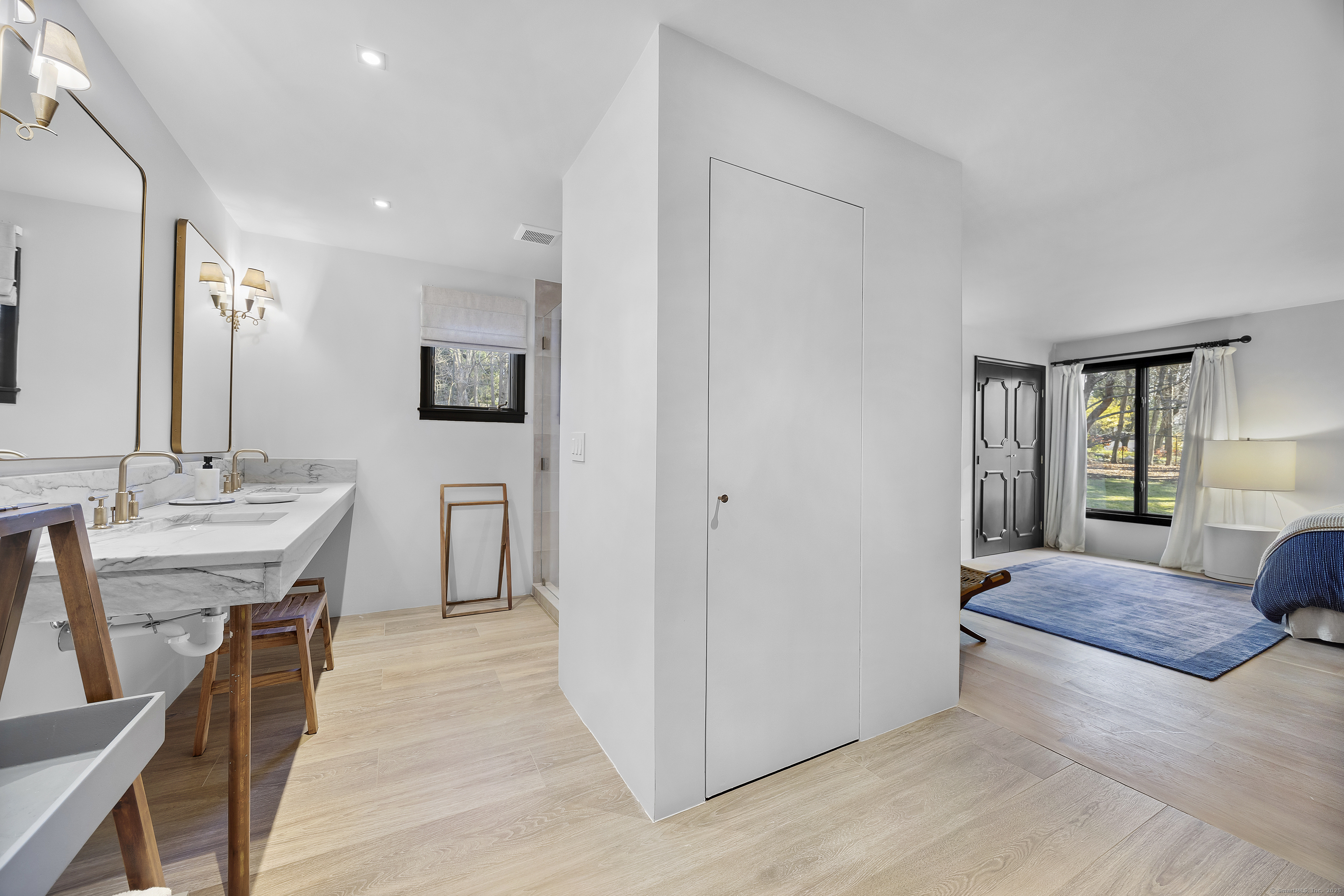 1001 Hulls Farm Road Fairfield, CT 06890 - Photo 21 of 40 a living room with stainless steel appliances furniture a rug and a window