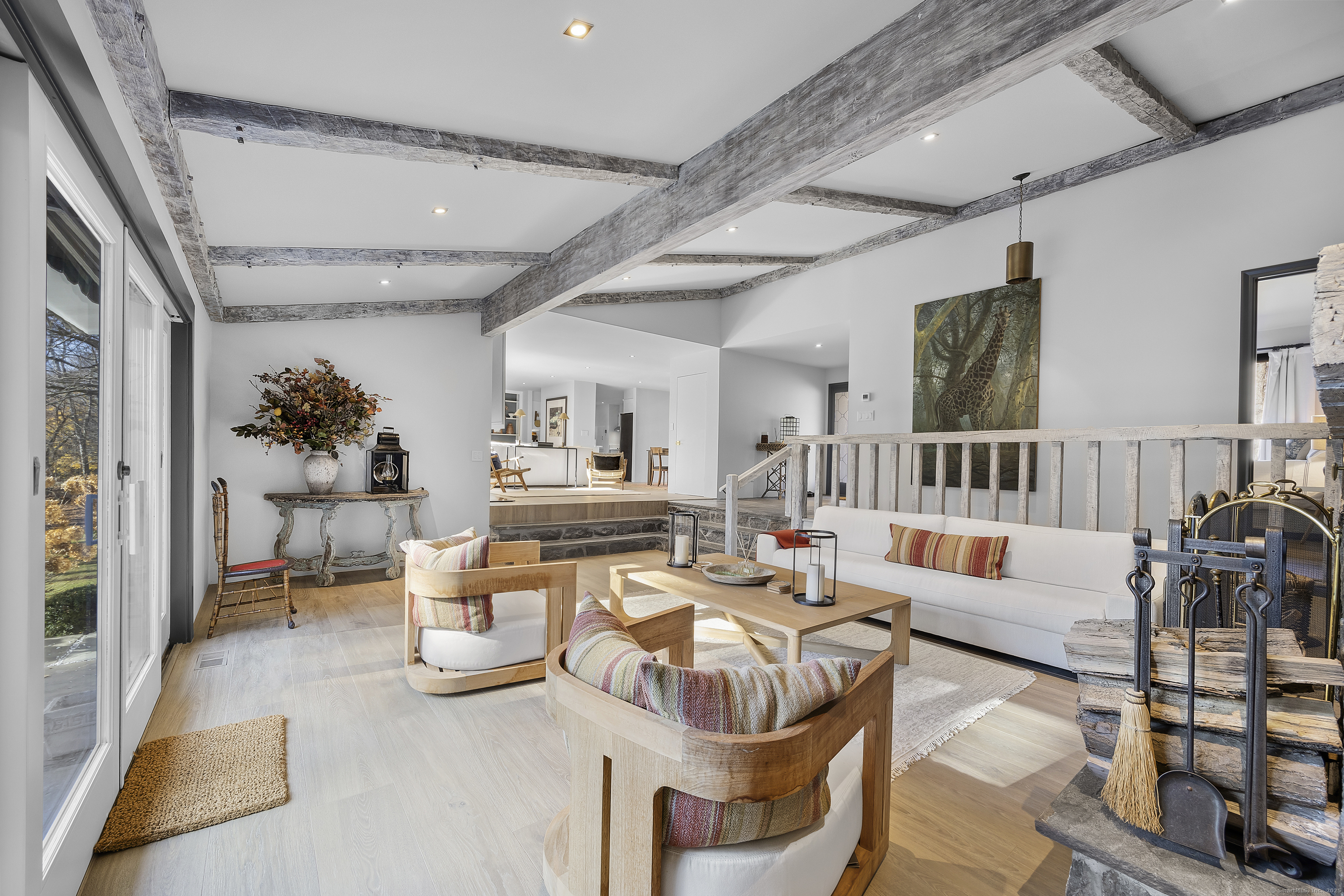 1001 Hulls Farm Road Fairfield, CT 06890 - Photo 7 of 40 a living room with furniture and wooden floor