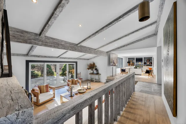 a view of a living room and dining room
