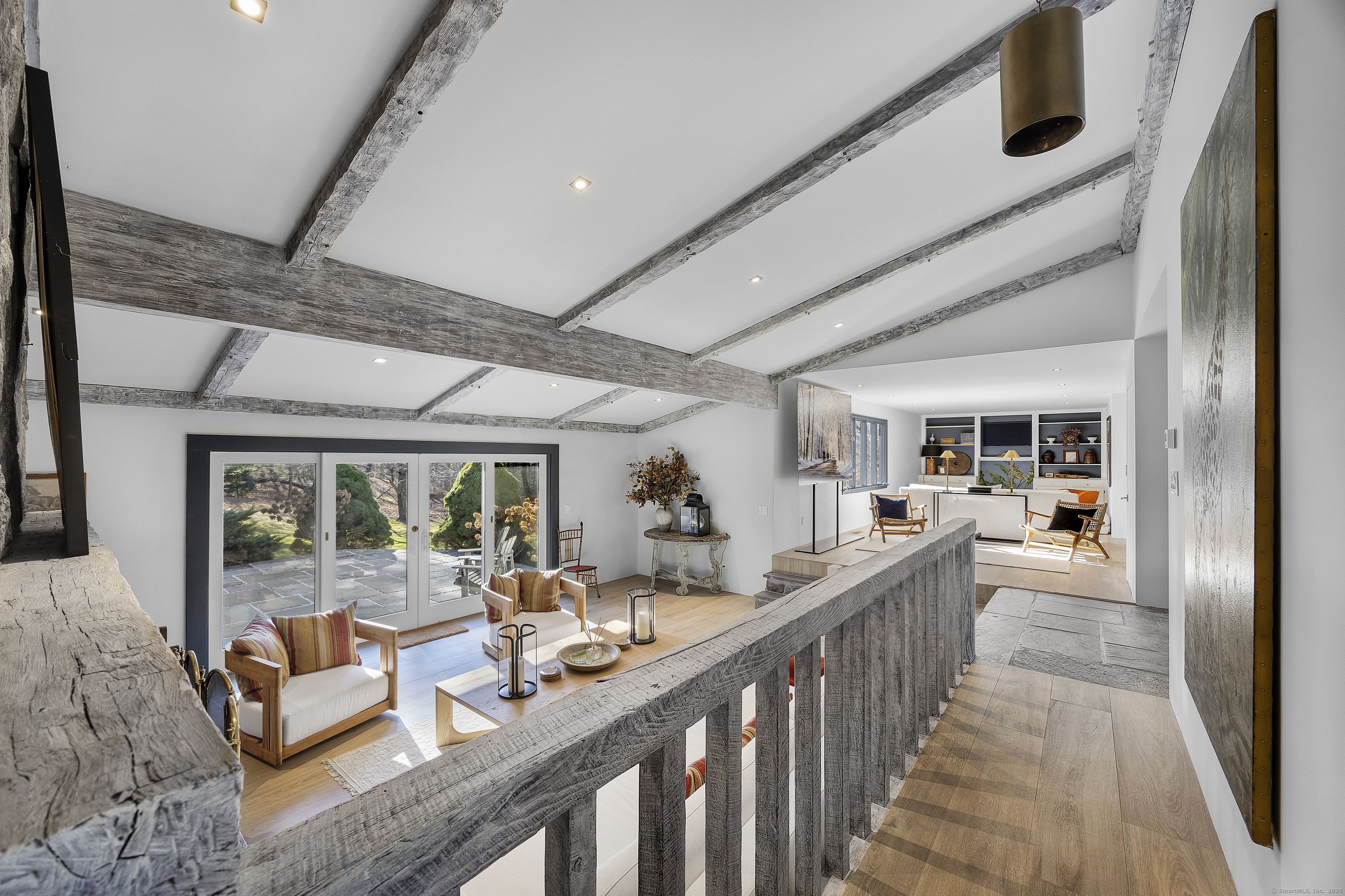 1001 Hulls Farm Road Fairfield, CT 06890 - Photo 9 of 40 a view of a living room and dining room