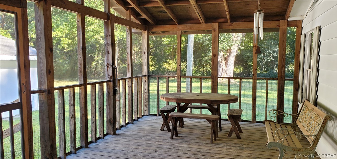 368 Osprey Road Cardinal, VA 23025 - Photo 11 of 23 a view of a porch with furniture and wooden floor