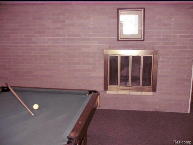 3702 North Road North Street, MI 48049 - Photo 17 of 20 LOWER LEV. FIREPLACE