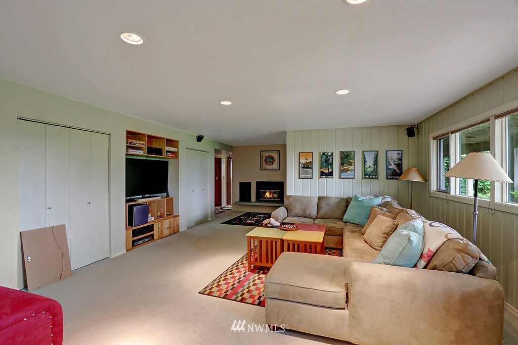 1031 C Avenue South Edmonds, WA 98020 - Photo 17 of 25 a living room with furniture and a flat screen tv