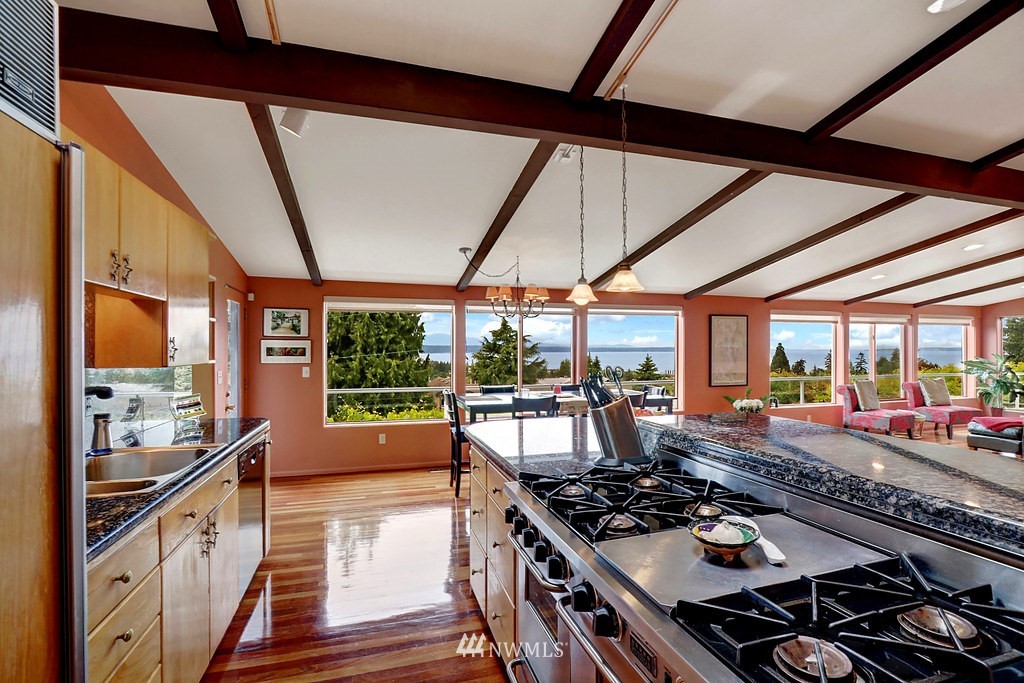 1031 C Avenue South Edmonds, WA 98020 - Photo 4 of 25 a kitchen with stove and wooden floor