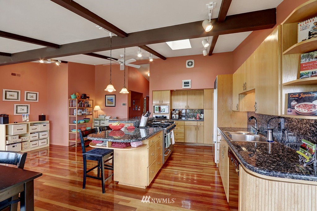1031 C Avenue South Edmonds, WA 98020 - Photo 5 of 25 a kitchen with stainless steel appliances kitchen island granite countertop lots of counter top space