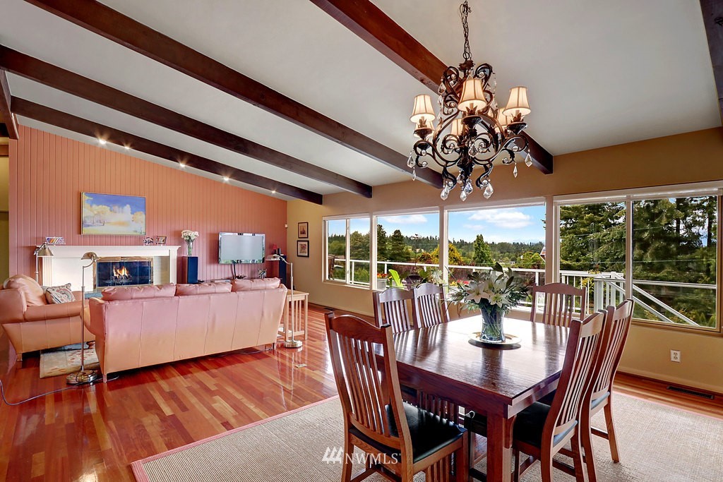 1031 C Avenue South Edmonds, WA 98020 - Photo 6 of 25 a view of a dining room with furniture window and outside view