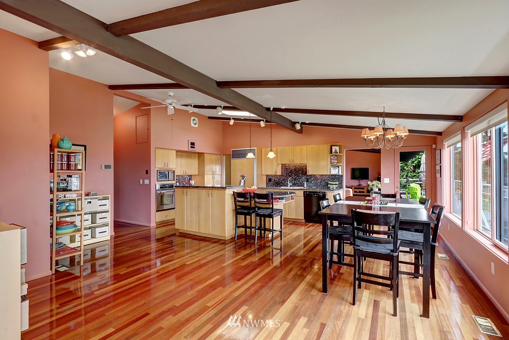 1031 C Avenue South Edmonds, WA 98020 - Photo 9 of 25 a view of a dining room with furniture and wooden floor