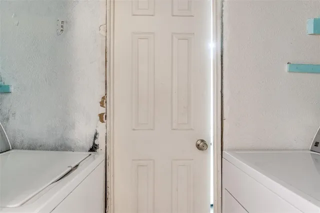 a bathroom with a sink and vanity