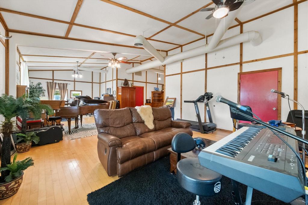 126 Smallwood Court Springtown, TX 76082 - Photo 10 of 24 Spacious living room, art studio, music room, office and more...
