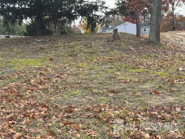 1207 Marlboro Road Old Bridge, NJ 08857 - Photo 2 of 6 a view of a outdoor space with trees