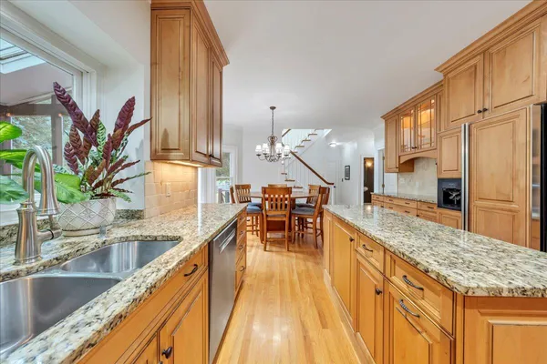 an empty room with white wall and window