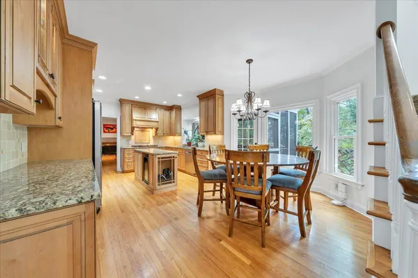a bathroom with a granite countertop sink vanity and a mirror