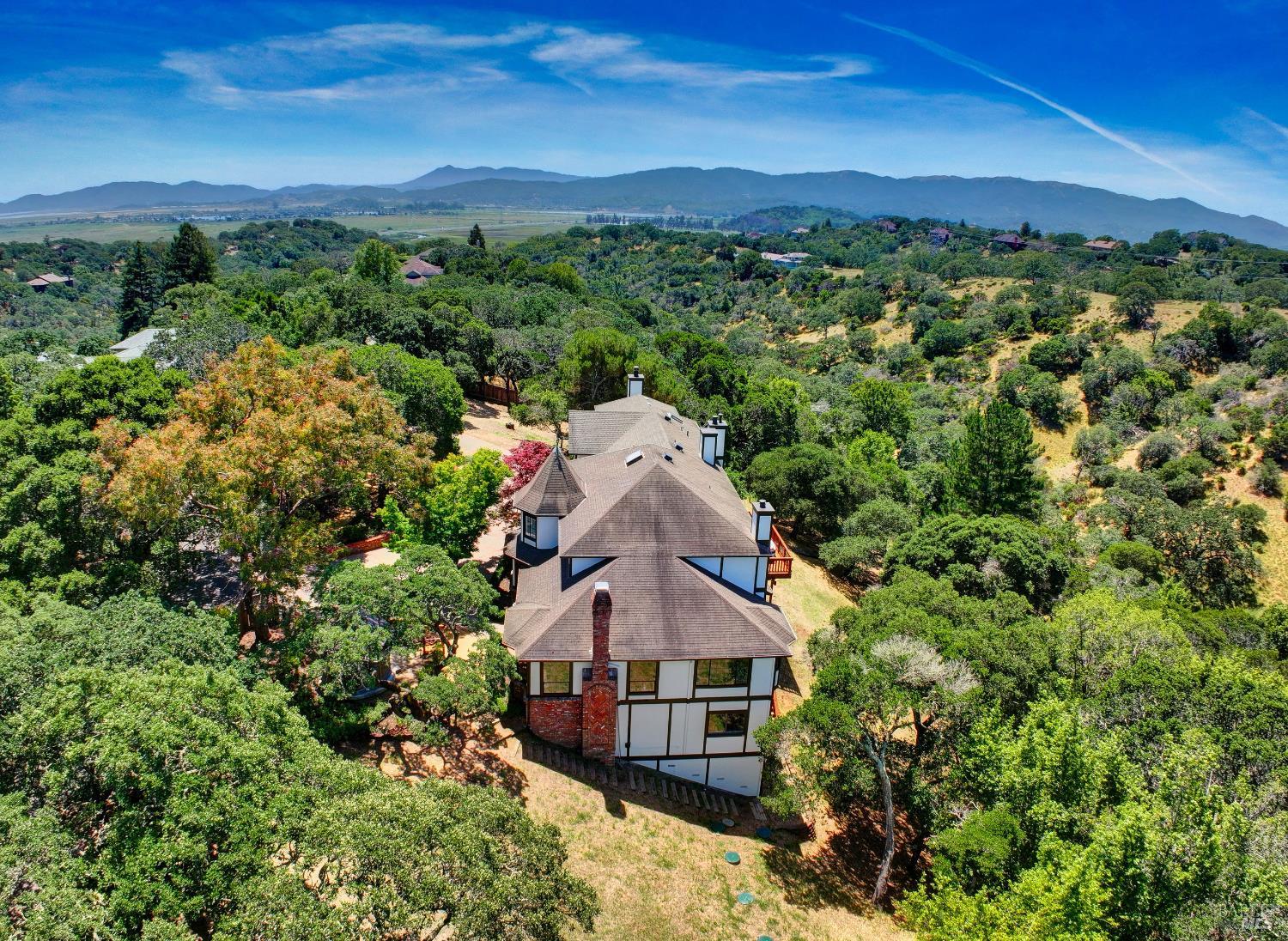 10 Lockton Lane Novato, CA 94945 - Photo 57 of 68 Aerial perspective of the property surrounded by mature trees, privacy, and the natural Novato landscape.