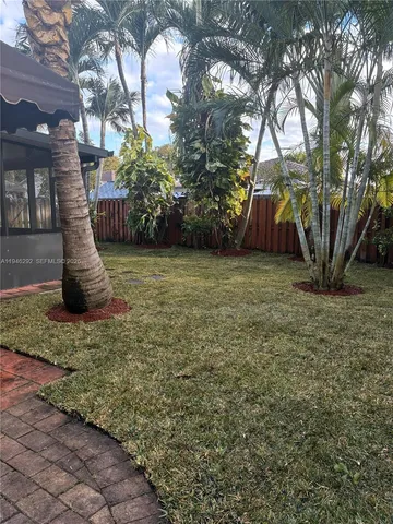 a view of outdoor space and yard
