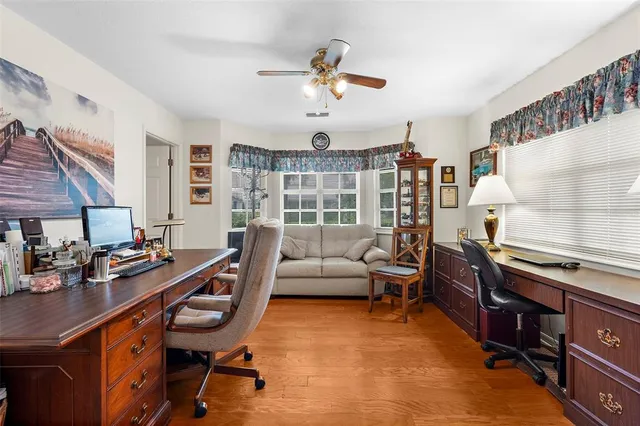 a view of a livingroom with furniture and a window