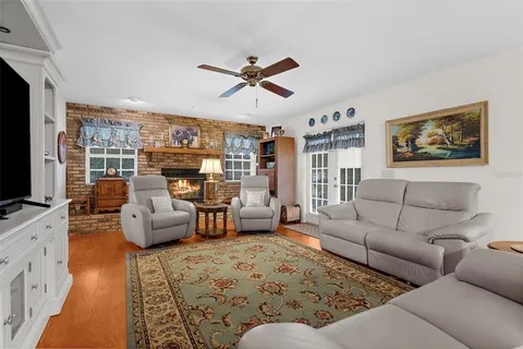 a living room with furniture or couch and a flat screen tv