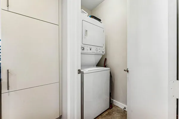 a view of a storage & utility room with washer and dryer