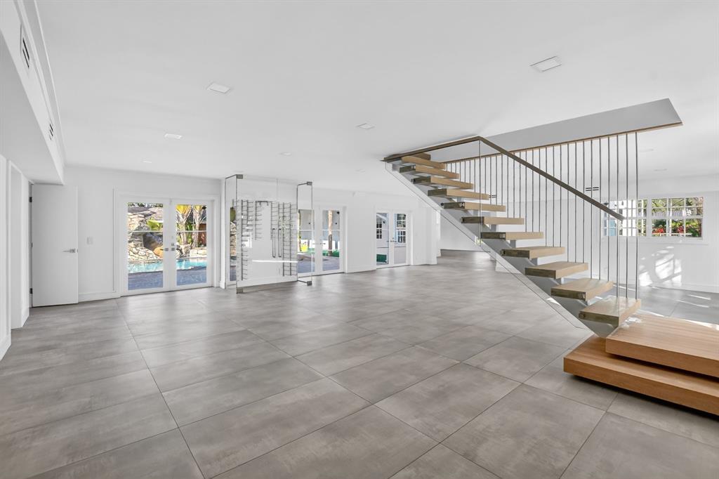 8233 Stagecoach Lane Boca Raton, FL 33496 - Photo 12 of 88 a view of entryway and hall with wooden floor